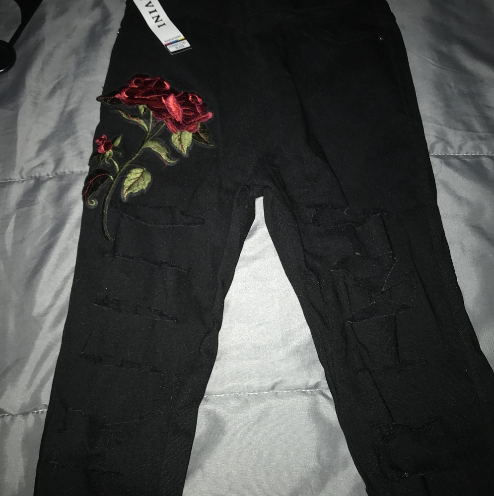 Black ripped pants